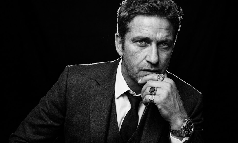 black and white portrait of a man in a dark suit — free Google Gemini prompt preview